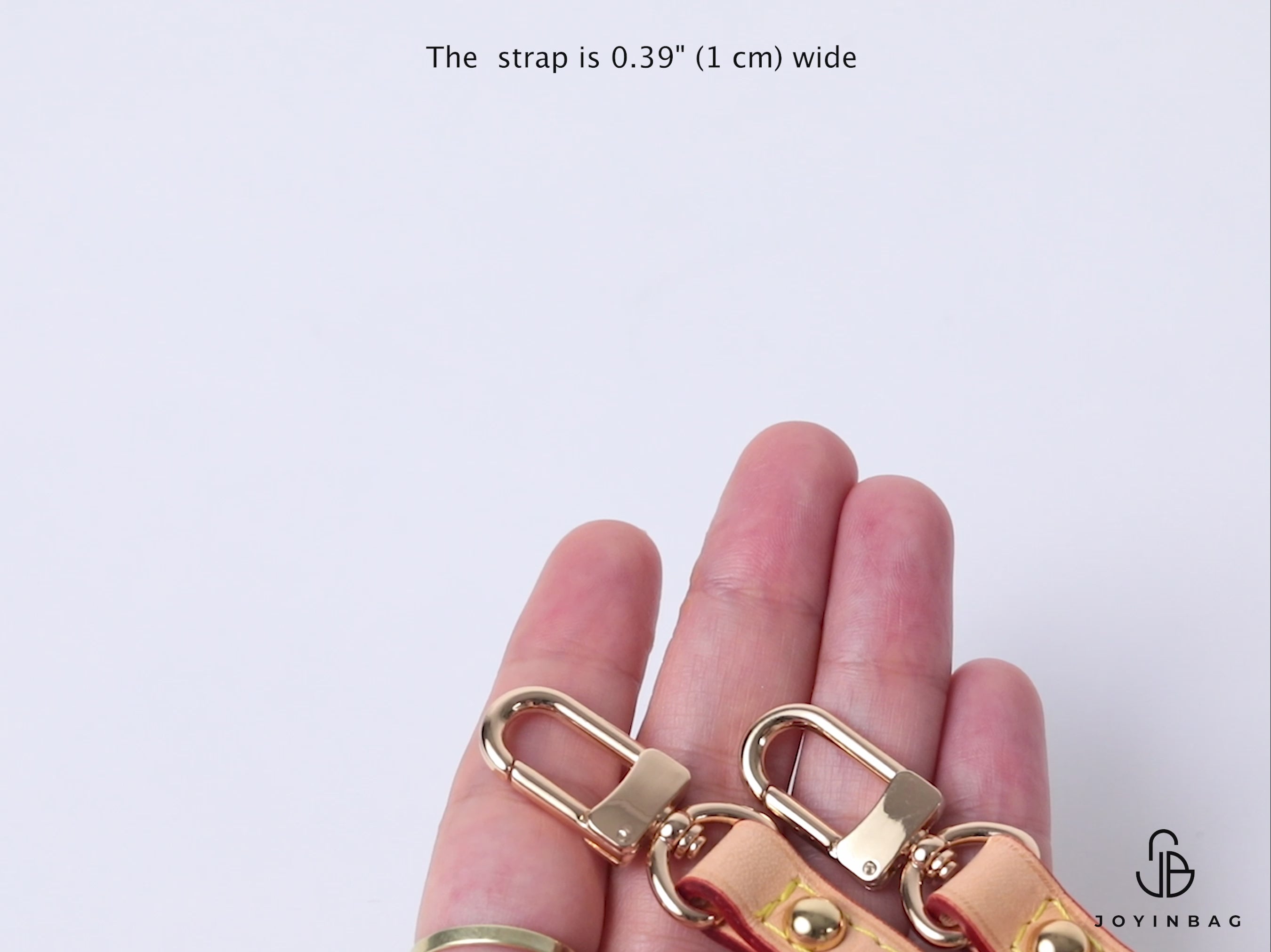 This video shows all the colors and details of this vachetta strap, which has a clip on both ends.