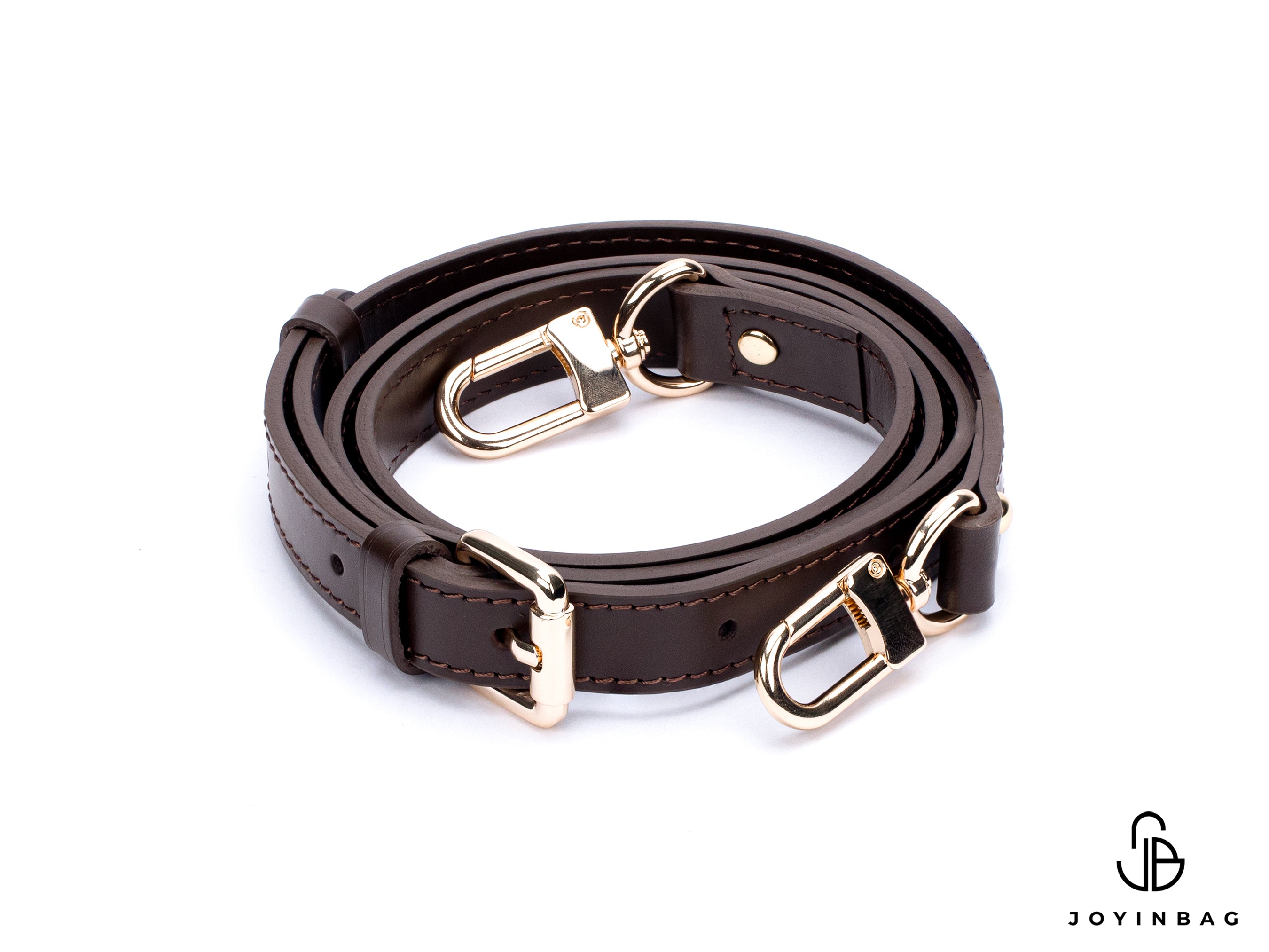 Adjustable dark brown vachetta strap with clasp closure at both ends.